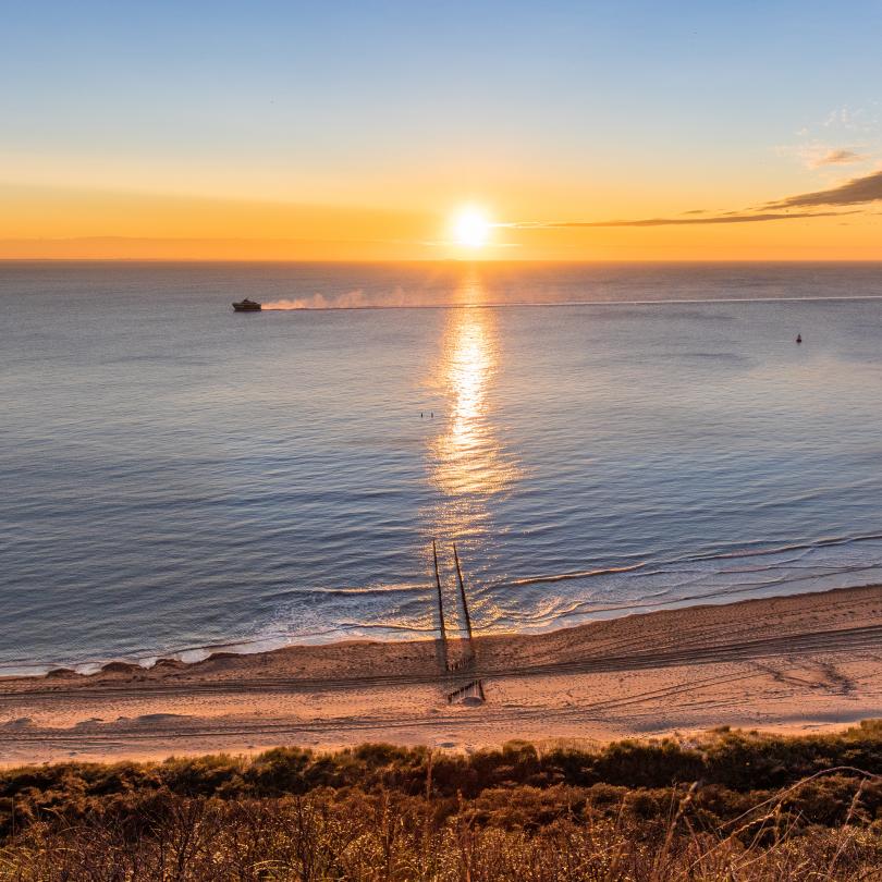 De zon zien zakken in de zee bij Valkenisse