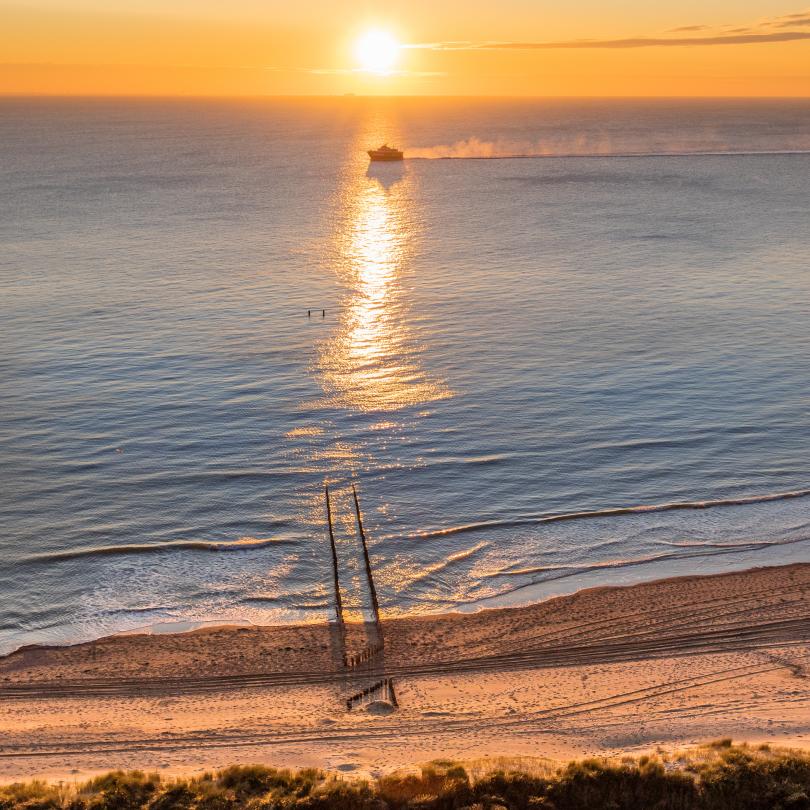 De zon zien zakken in de zee bij Valkenisse
